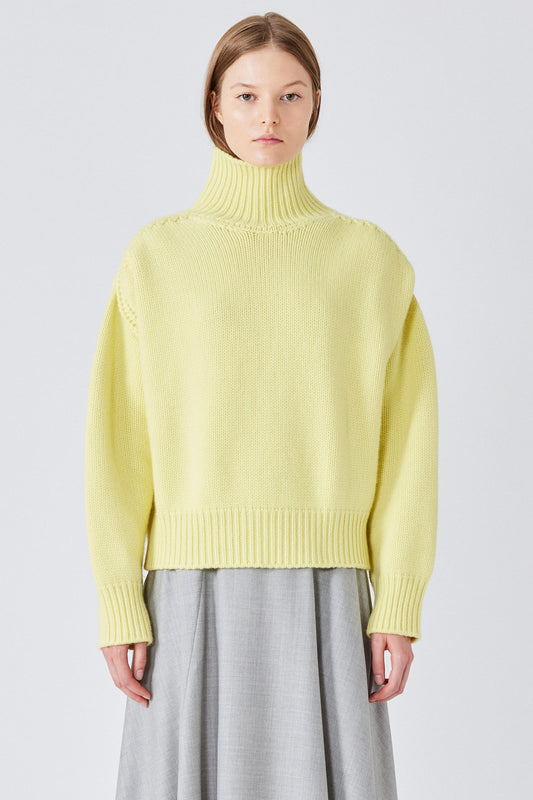 Maglione Gaia in cashmere con collo alto e spacco posteriore