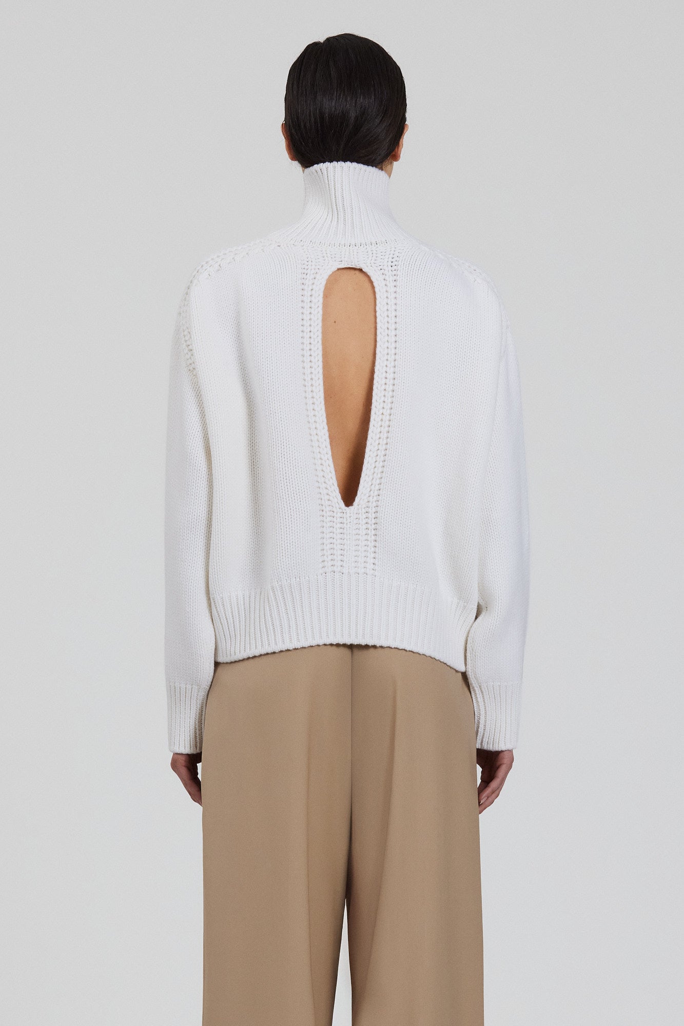 Gaia high neck cashmere sweater with back slit
