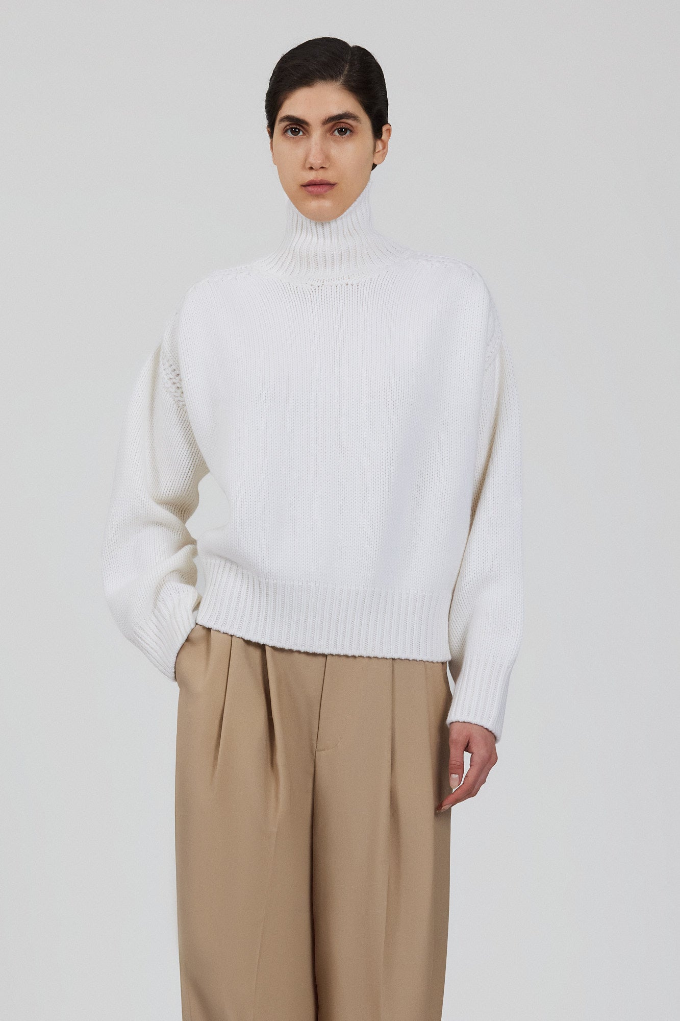 Gaia high neck cashmere sweater with back slit