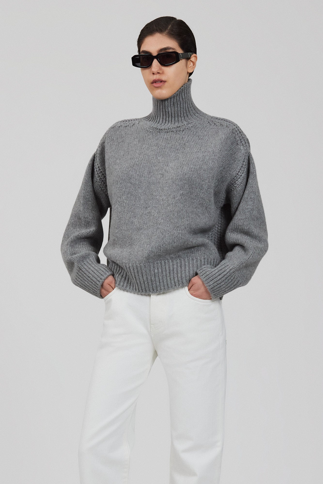 Gaia high neck cashmere sweater with back slit