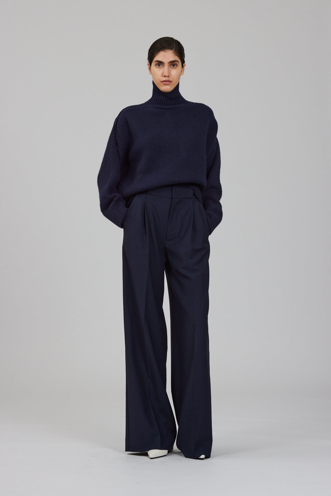 Gaia high neck cashmere sweater with back slit