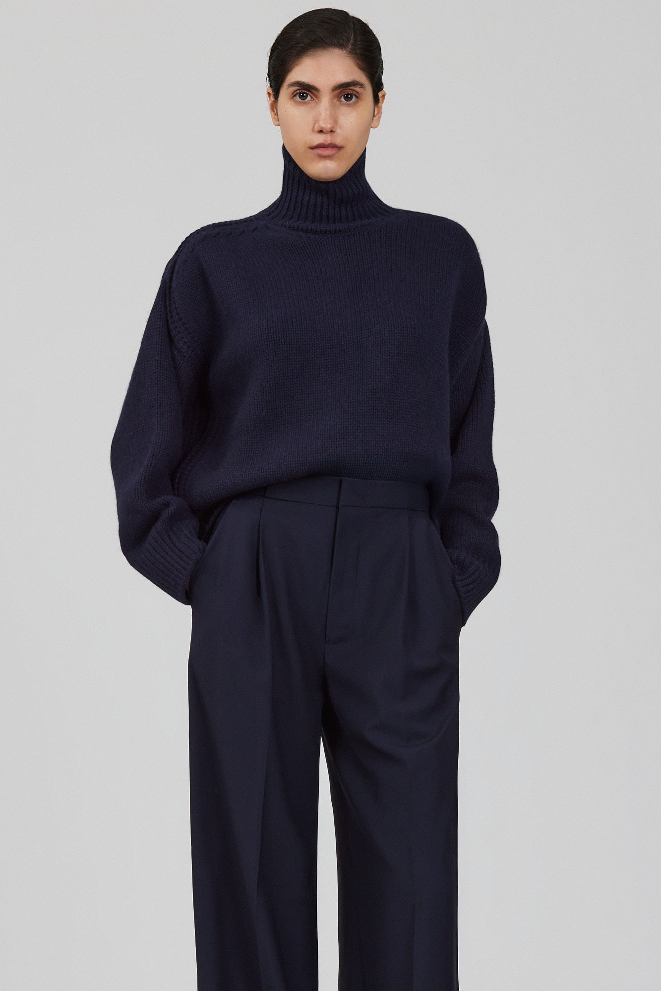 Gaia high neck cashmere sweater with back slit