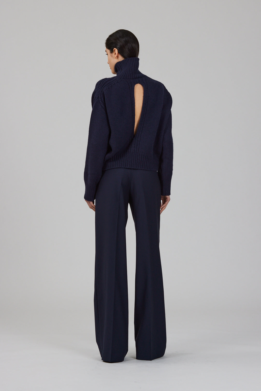 Gaia high neck cashmere sweater with back slit