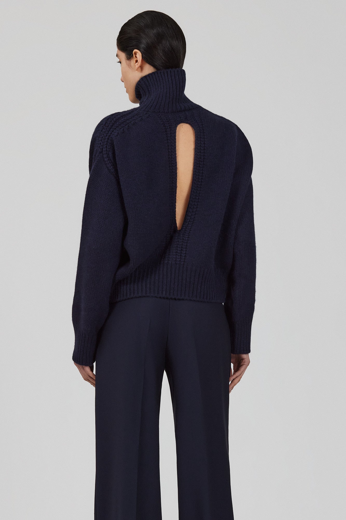 Gaia high neck cashmere sweater with back slit