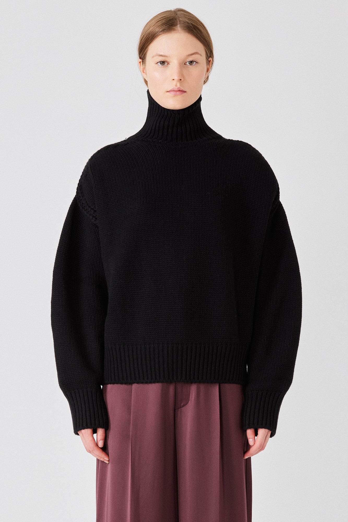 Gaia high neck cashmere sweater with back slit