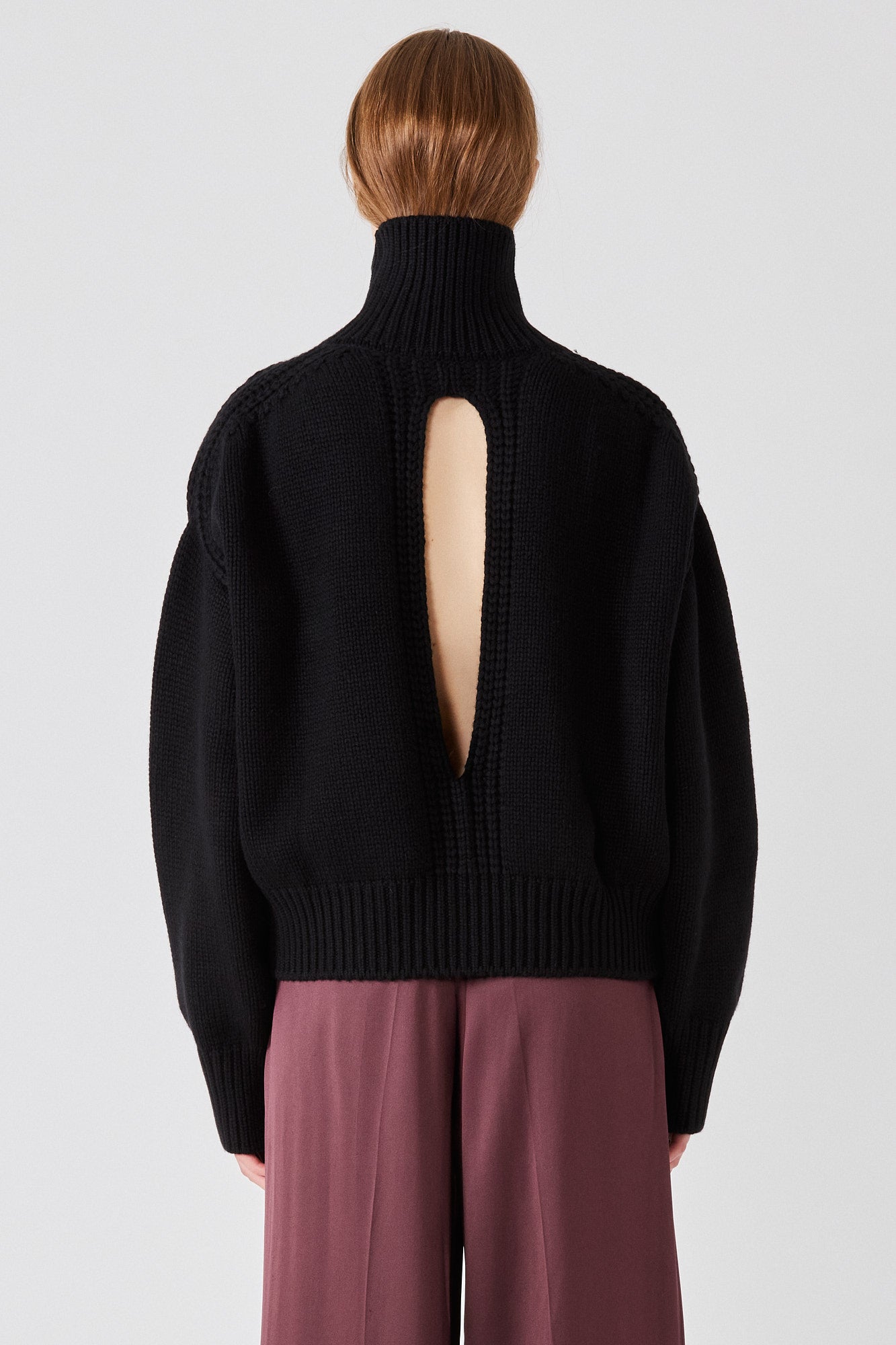 Gaia high neck cashmere sweater with back slit