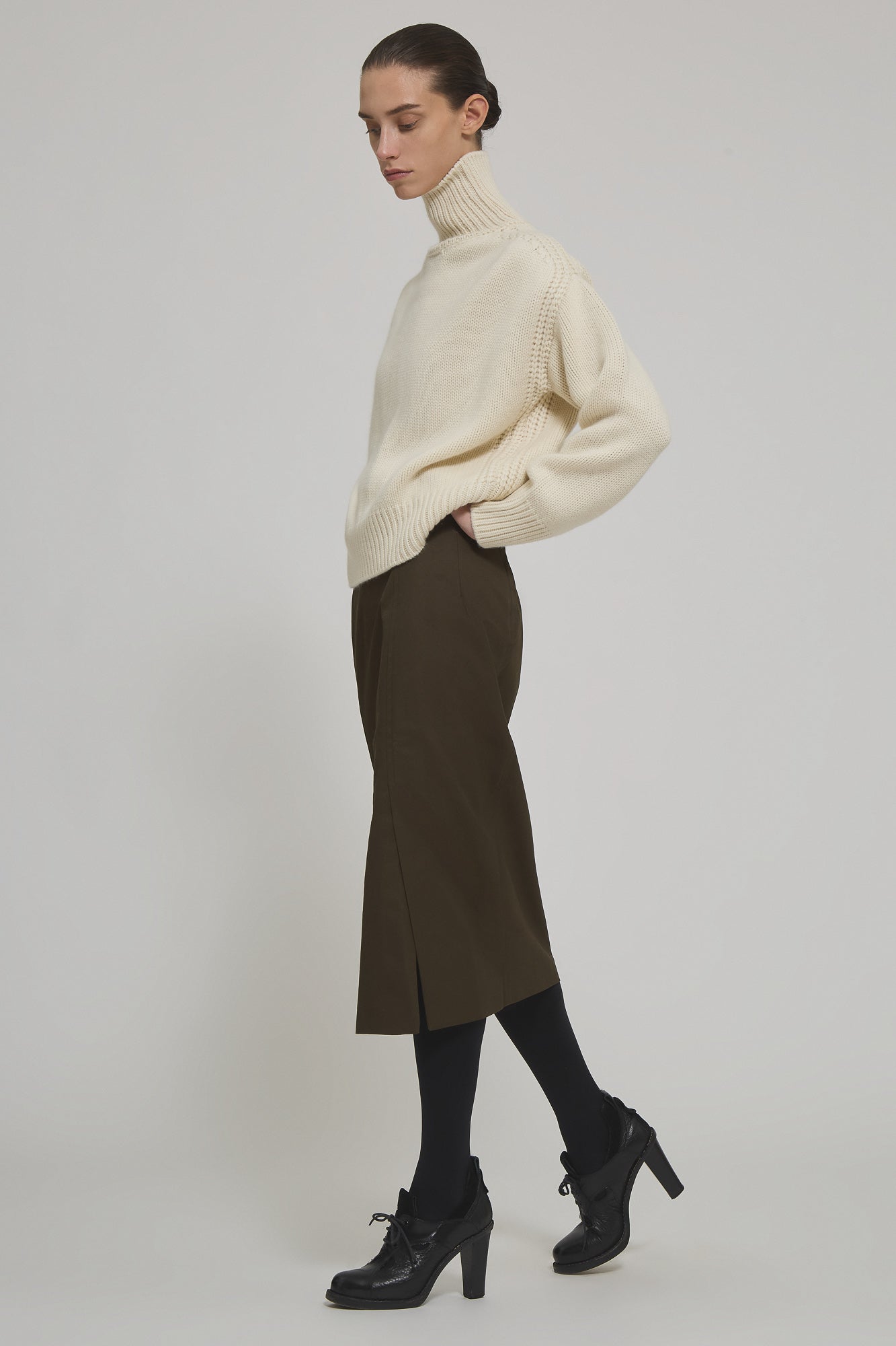 High neck cashmere sweater with back slit