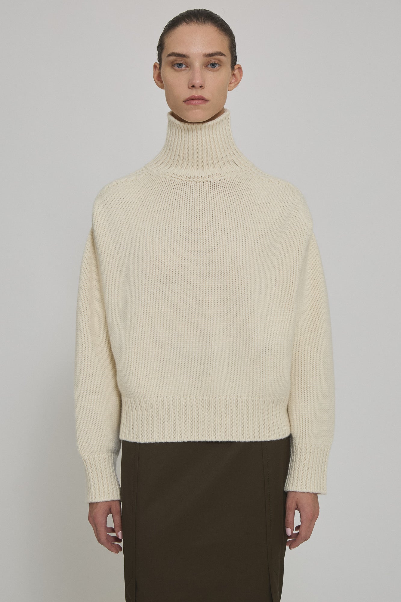 High neck cashmere sweater with back slit