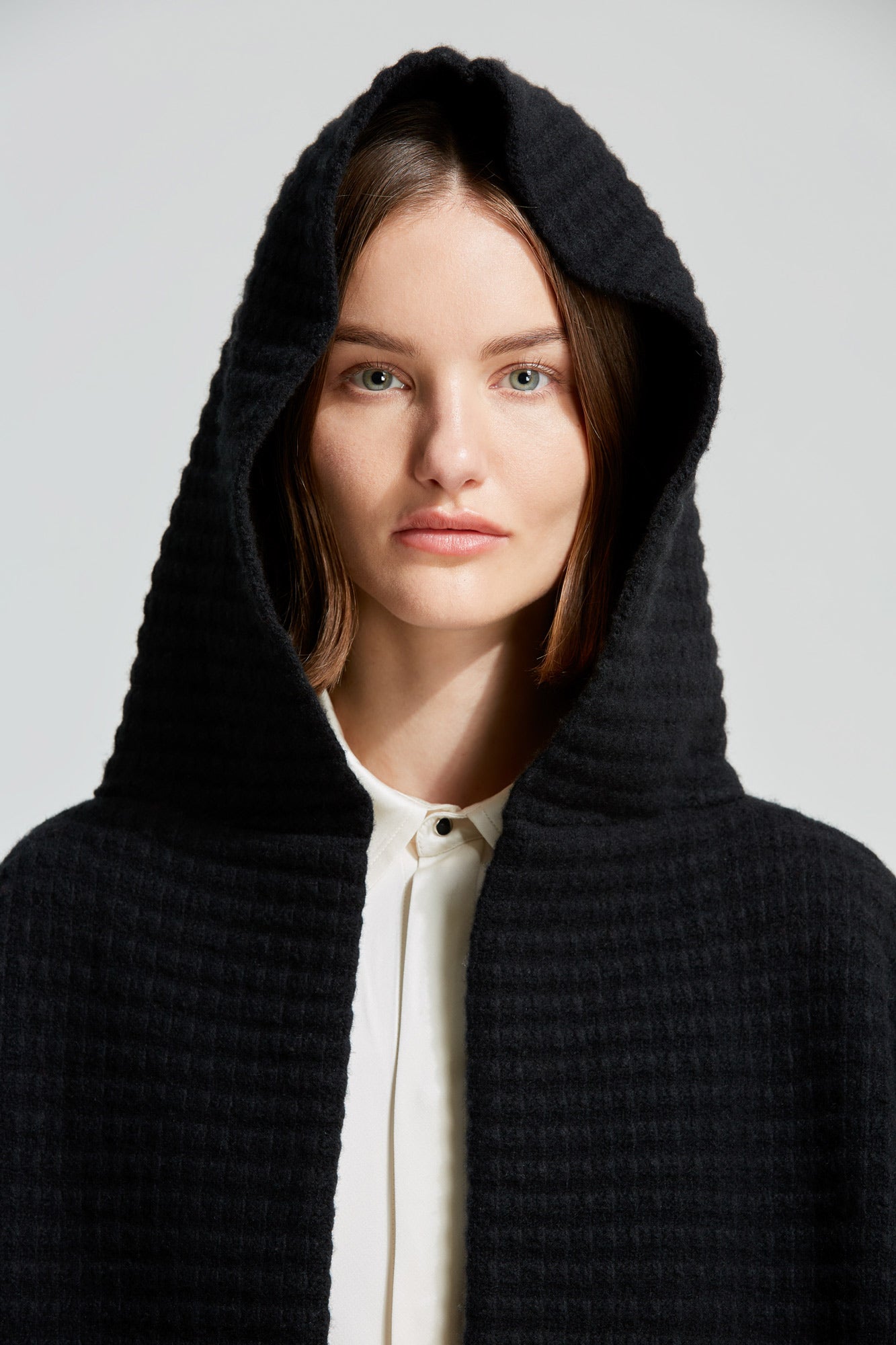 Stella cashmere blend sleeveless knit poncho with hood